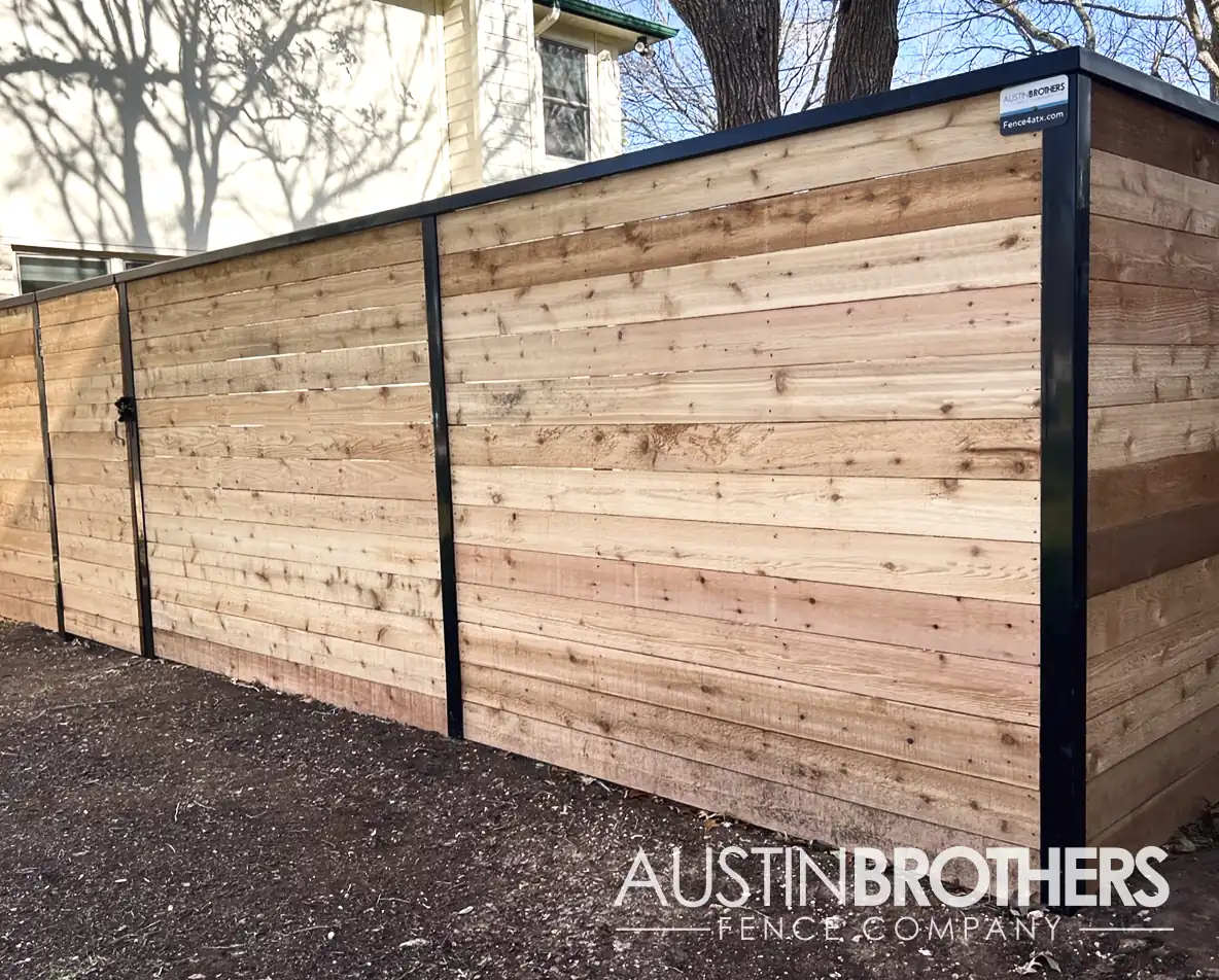 Horizontal wooden fence with steel frames.