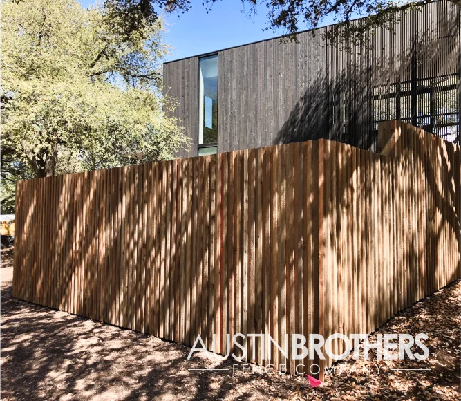 Vertical wooden fence to match the aesthetic of a modern Austin home.