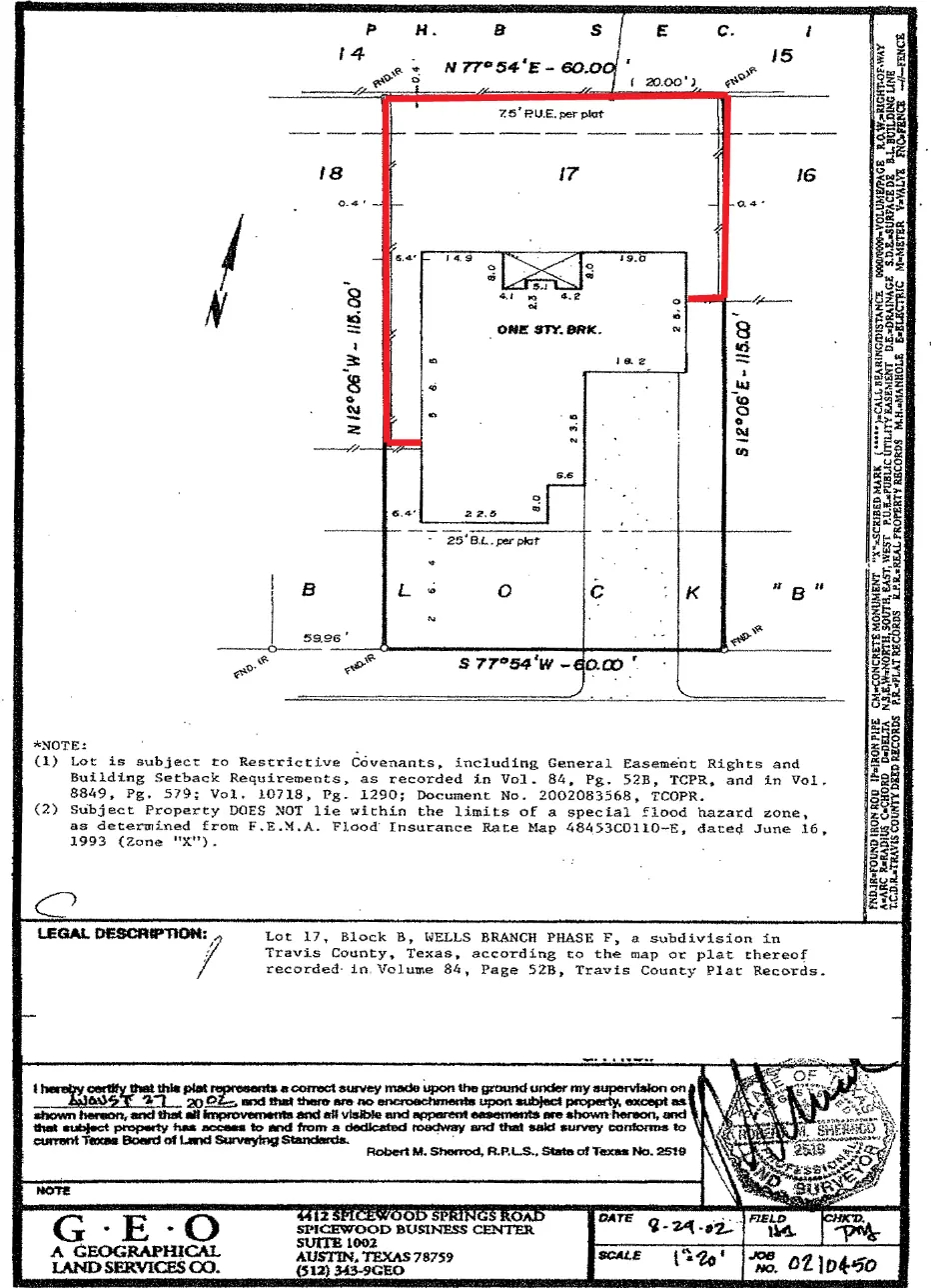 An example property survey with the proposed fence line drawn on it in red.